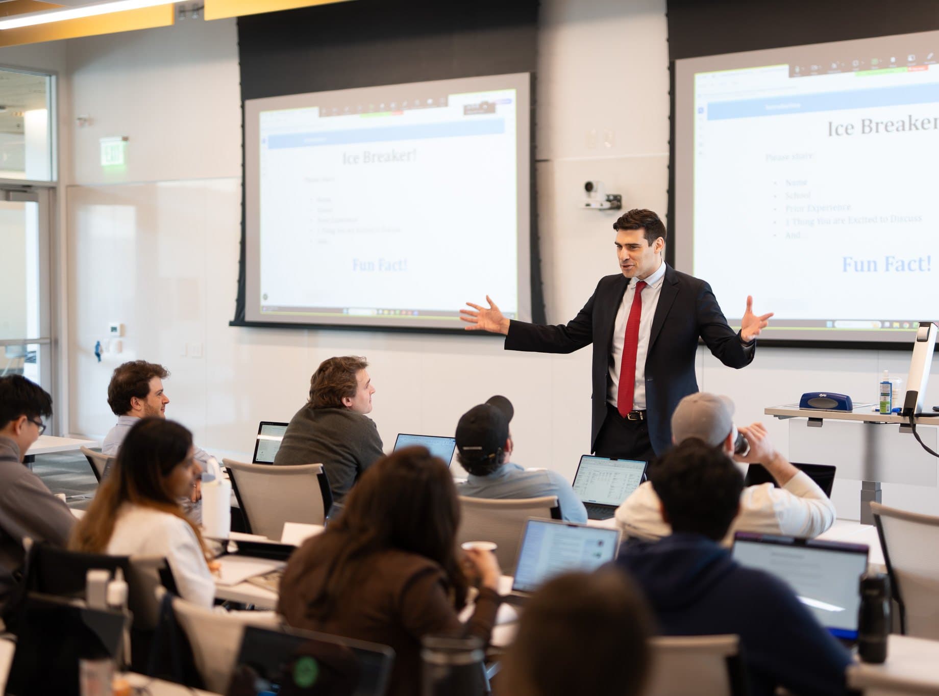 Robert Monaco teaching a room of analysts